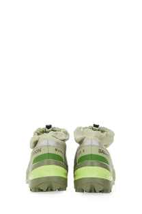 Mm6 Maison Margiela women’s cross low sneaker in olive green and neon lime with a drawstring cuff design