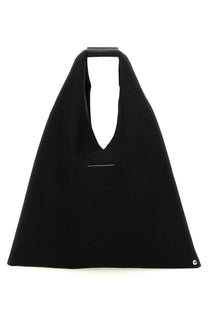 Mm6 maison margiela women’s black minimalist tote bag with structured silhouette and subtle white stitching detail