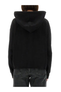Black hooded sweatshirt by mm6 maison margiela with relaxed fit and ribbed cuffs for womens casual wear