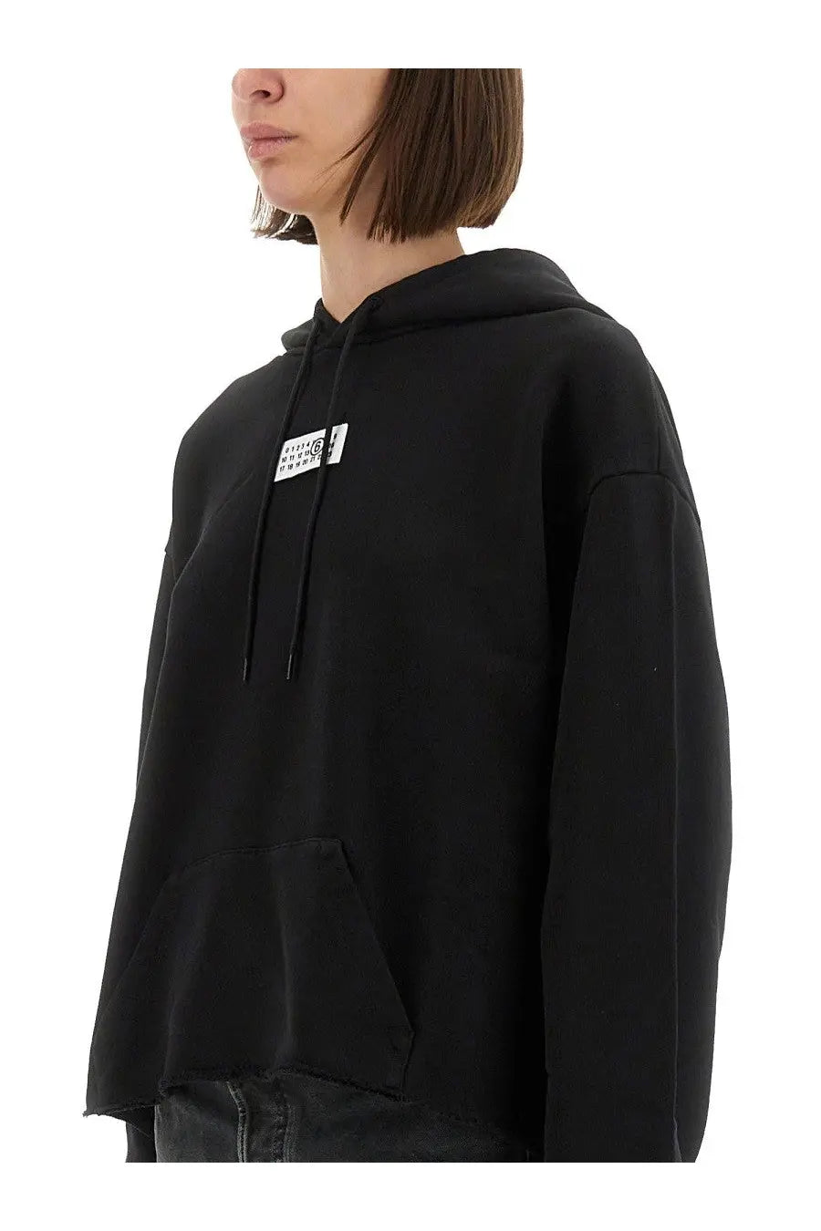 Mm6 maison margiela women’s black oversized hoodie with white logo patch and matching drawstrings on the chest