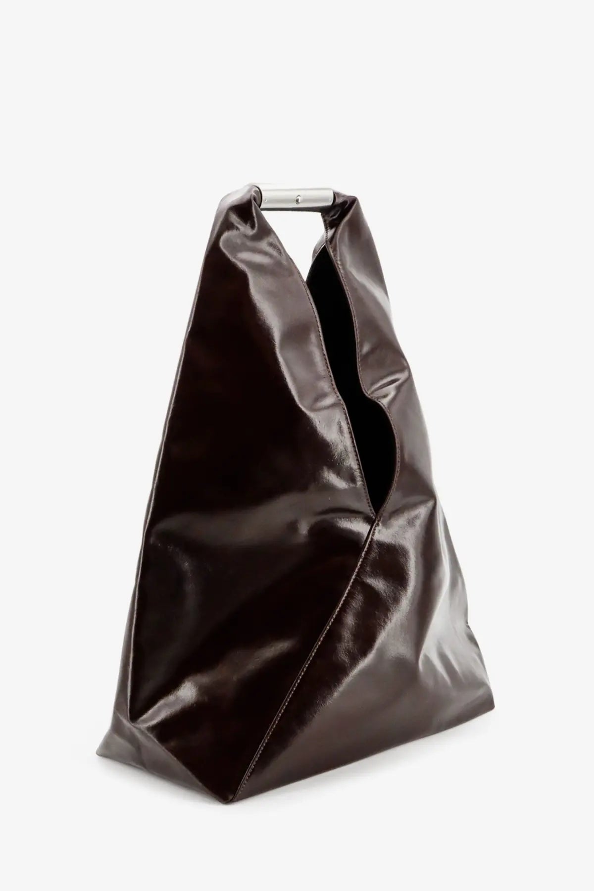 A sleek black patent leather tote bag with minimalist silver metal handle for stylish shoulder wear