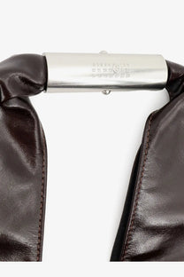 Dark brown leather strap with polished silver clasp and engravings on mm6 maison margiela japanese shiny leather shoulder bag