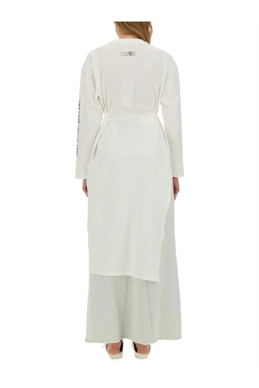 Back view of mm6 maison margiela women’s white jersey shirt long-sleeved with wrap design and belted waist