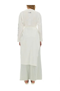 Back view of mm6 maison margiela women’s white jersey shirt long-sleeved with wrap design and belted waist