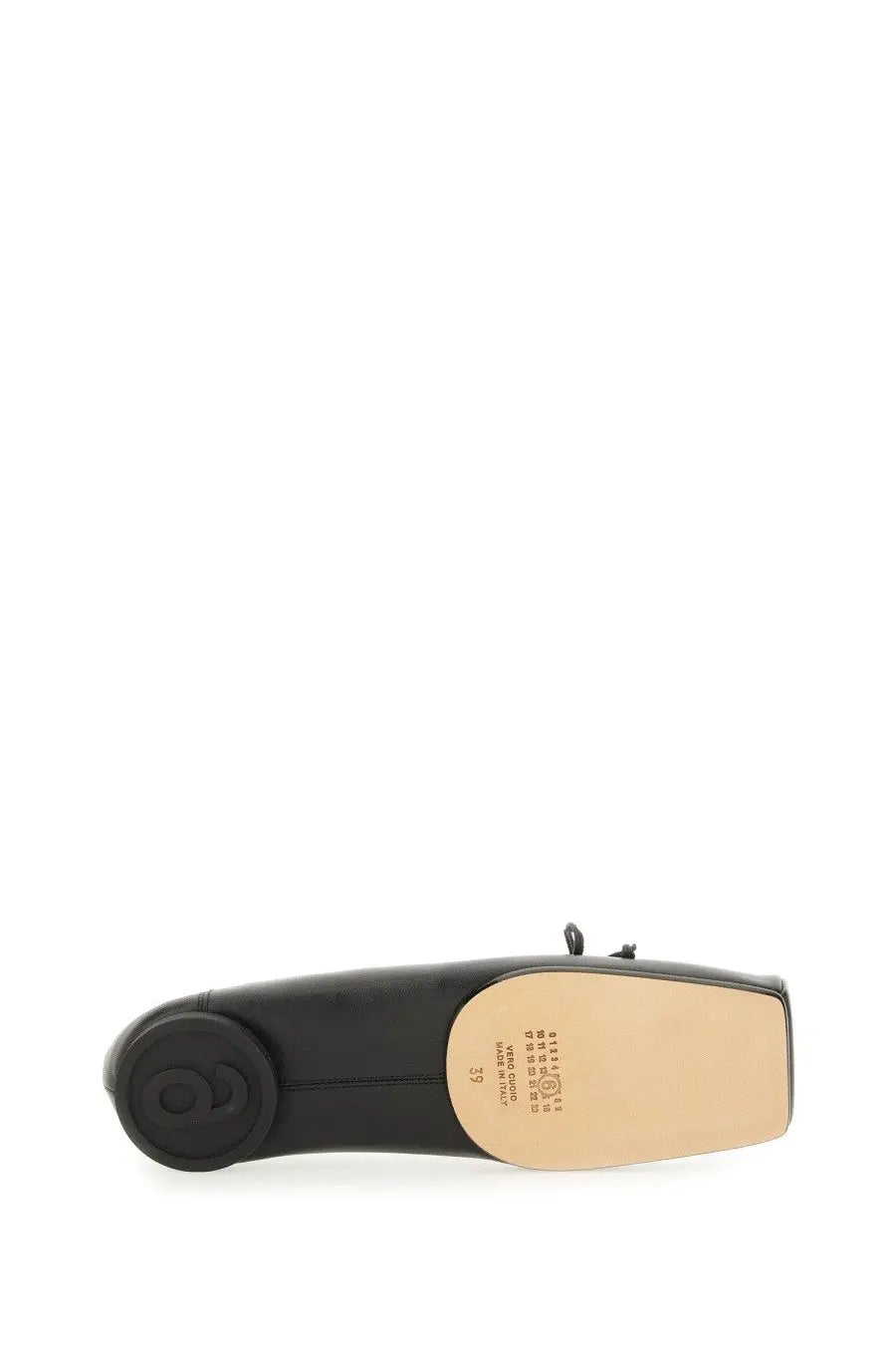 Back view of mm6 maison margiela womens black leather ballerina flat shoe with circular logo on heel and beige insole