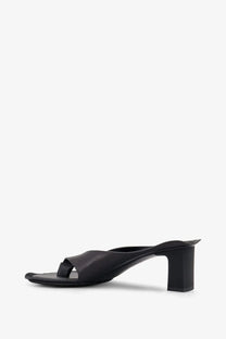 Mm6 maison margiela women’s black leather mule sandal with chunky heel and minimalist design front view
