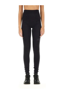 Black high-waisted mm6 maison margiela women’s leggings with sleek form-fitting design and subtle thigh branding