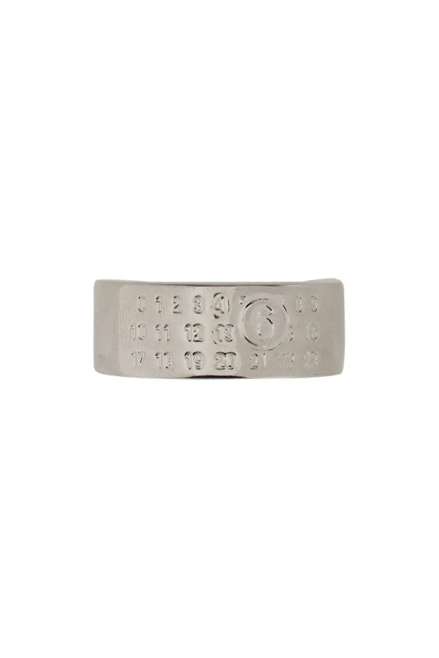 Silver-toned metal ring from mm6 maison margiela featuring an engraved calendar design and a circular emblem