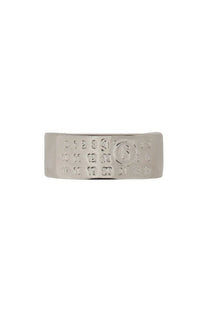 Silver-toned metal ring from mm6 maison margiela featuring an engraved calendar design and a circular emblem