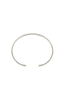 Silver-toned minimalist MM6 Maison Margiela women’s rigid cuff bracelet with sleek open design and smooth metallic finish