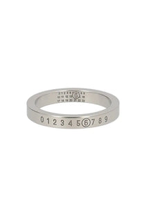 Silver-toned mm6 maison margiela women’s ring with engraved numerals and circular logo featuring number 6 prominently