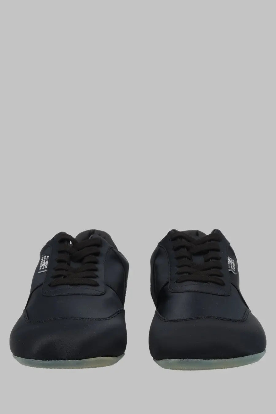 Mm6 maison margiela women’s sneaker factory in raso black black leather sneakers with matching laces and subtle side branding