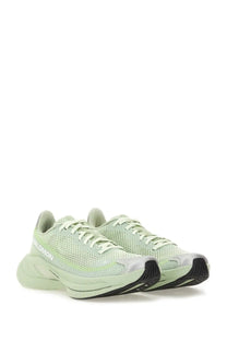 Mm6 maison margiela women’s spectur sneaker white in light green mesh with sleek design and black rubber soles