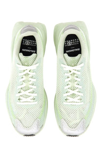 Light green mesh salomon sneakers with white laces and translucent sculpted sole from mm6 maison margiela women