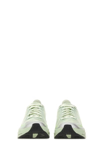 Mm6 maison margiela women’s spectur sneaker in light green mesh with silver accents and black rubber soles