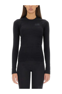 Mm6 Maison Margiela women’s black long-sleeved performance top with subtle chest logo for active wear