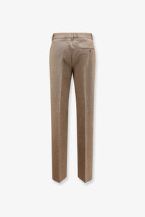 Beige textured virgin wool trousers with subtle pattern and tailored fit from MM6 Maison Margiela womenswear
