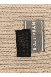 Beige ribbed knit wool blend sweater with black size tag and gray woven mm6 maison margiela label