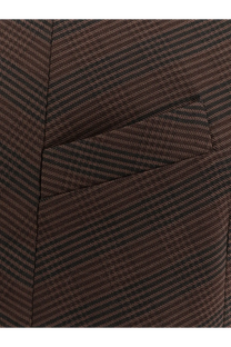 A close-up of brown and black herringbone wool blend fabric from mm6 maison margiela women’s short dress