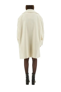 Cream-colored oversized wool coat with structured collar and straight cut silhouette from mm6 maison margiela