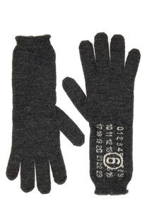 Dark gray wool gloves by mm6 maison margiela with white numerical and logo pattern on the back of one hand