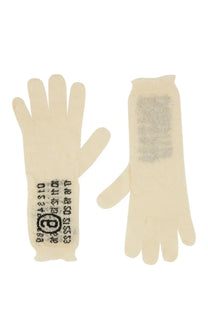 Cream-colored MM6 Maison Margiela women’s wool gloves showing the textured back with an e logo label visible