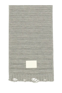 Mm6 maison margiela women’s wool scarf in grey with a ribbed knit texture, frayed edges, and a small white label