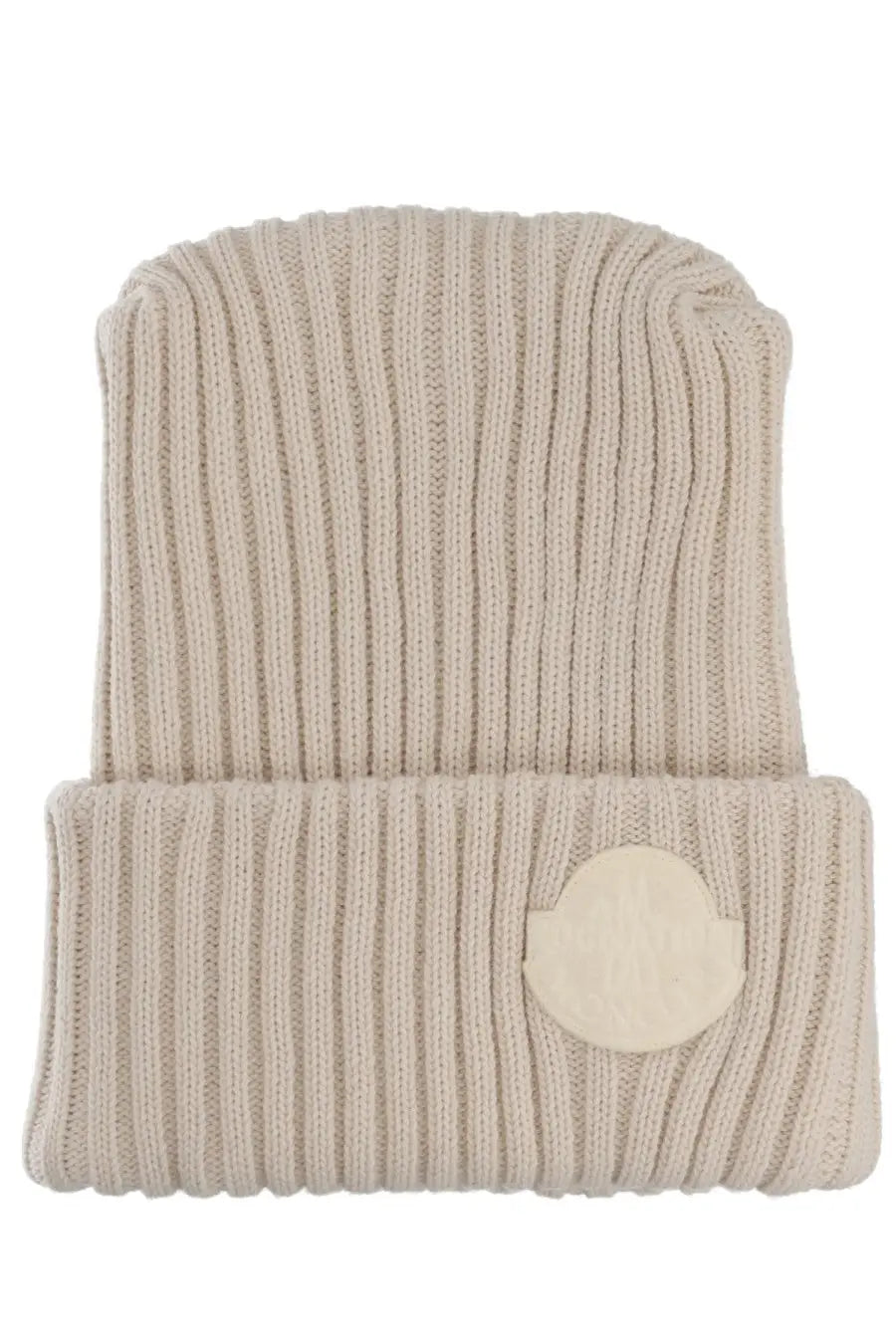 Beige ribbed knit wool beanie with circular logo patch on folded brim from moncler genius men’s collection