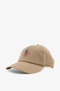 Beige cotton baseball cap by moncler grenoble with red and black embroidered logo on the front