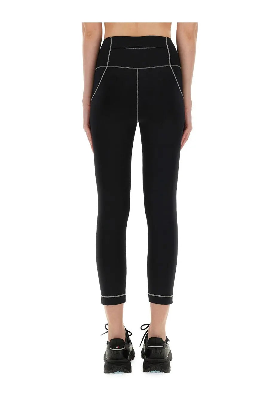 Moncler Grenoble women’s black high-waisted leggings with subtle white stitching along the seams and cuffs
