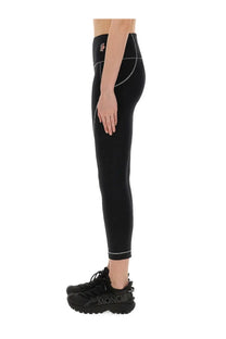 Moncler Grenoble women’s black high-waisted leggings with white stitching accents for stylish activewear