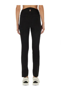 Black moncler grenoble women’s tailored trousers with sleek straight-leg cut and subtle logo at waistband