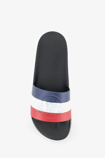 Moncler men’s Basile rubber slide sandal in black with navy white and red stripes on the foot strap