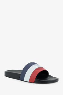 Moncler men’s Basile rubber sandal in black with a wide strap featuring vertical navy blue white and red stripes