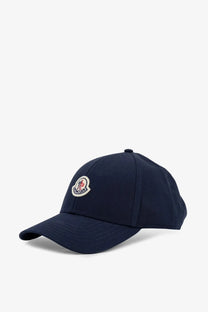 Navy blue Moncler men’s cotton baseball hat with a circular embroidered logo on the front