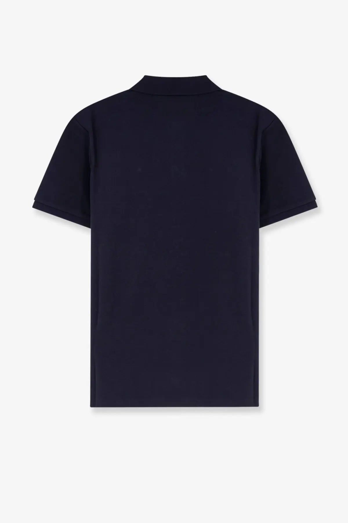 A sleek navy blue moncler men’s cotton polo shirt with short sleeves and a classic collar featuring a minimalist design