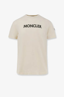 Cream-colored moncler men’s cotton t-shirt with black embroidered logo across the chest in white color