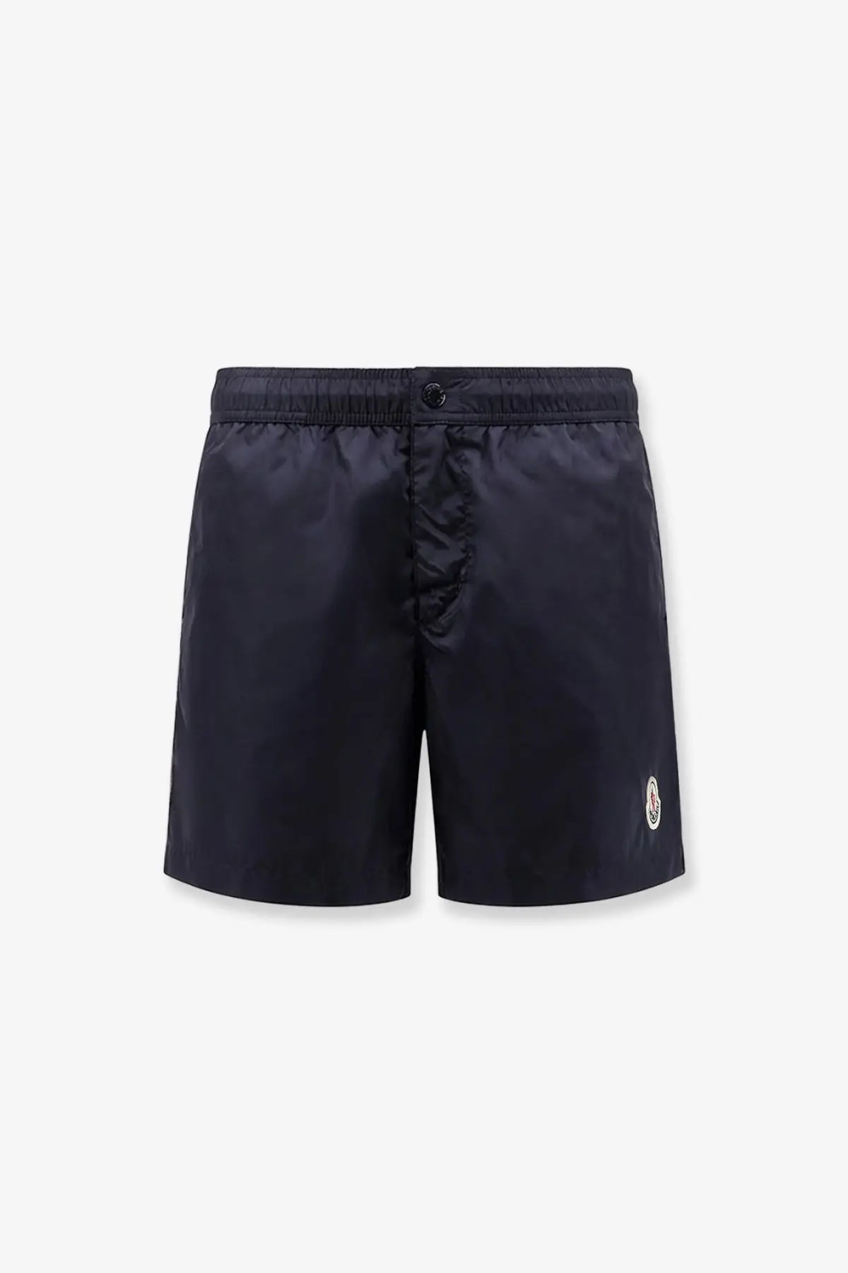 Dark navy moncler men’s nylon swim trunks with a subtle logo on the lower right leg for beachwear