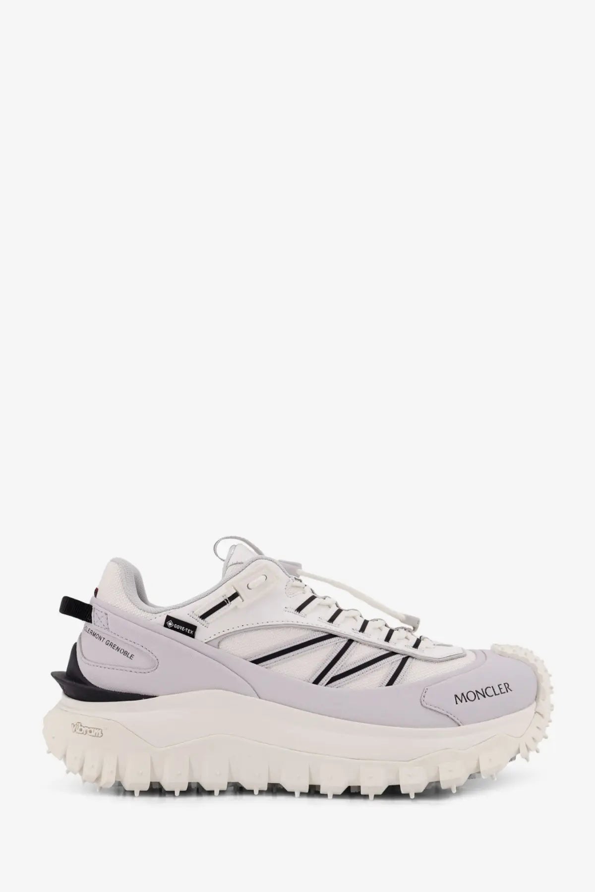 Moncler men’s trailgrip gtx leather and ripstop hiking sneaker in white with black accents and rugged textured sole