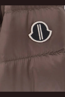 Brown puffer jacket with black and white embroidered moncler logo patch from moncler rick owens men’s flight parka down jacket gray