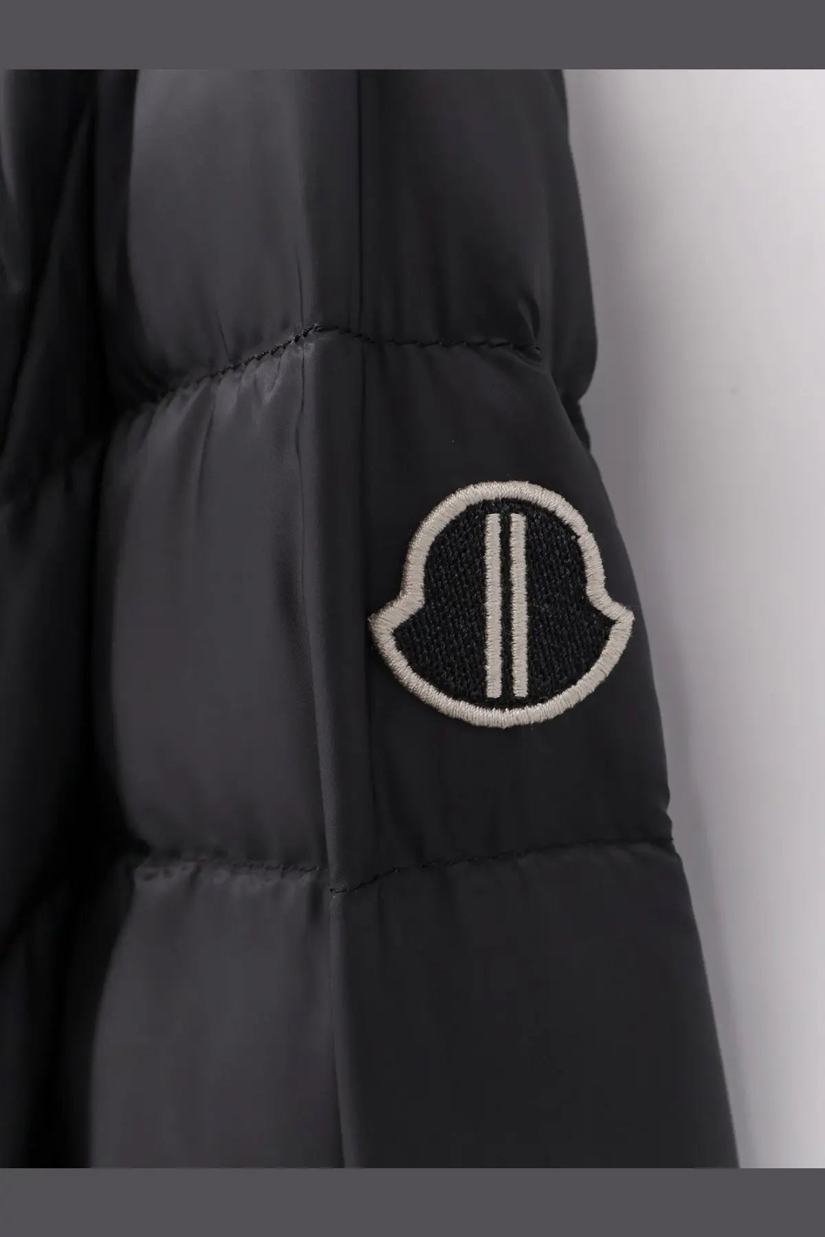 Black moncler and rick owens men’s zip lock hooded down jacket with white embroidered logo patch on sleeve