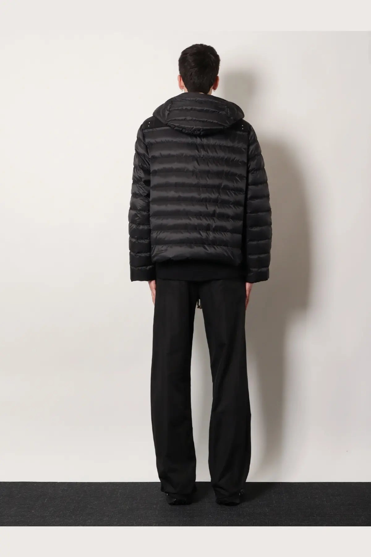 Black quilted puffer jacket with hood by Moncler and Rick Owens men’s zip lock down jacket in black