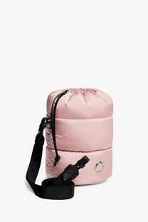 Moncler women’s caradoc nylon bucket bag pink with black adjustable strap and silver logo plaque