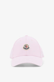 Moncler women’s soft pink cotton baseball hat with circular embroidered logo in red, blue, and black on front