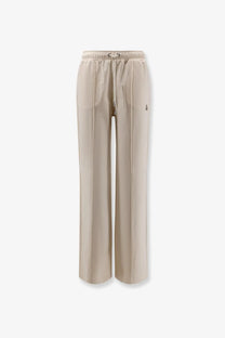 Moncler women’s white cotton jogging trousers with beige wide-leg pants elastic waistband and embroidered logo on thigh