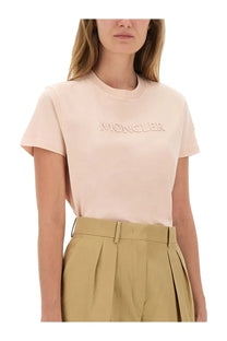 Moncler women’s cotton short-sleeved blush pink t-shirt with subtle embroidered logo across the chest