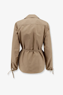 Moncler women’s beige cotton shirt jacket with belted waist, long sleeves, and drawstring cuffs