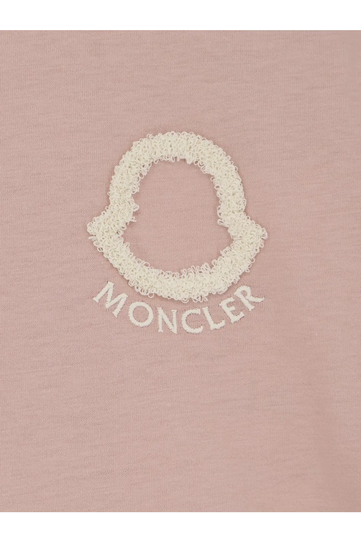 Moncler women’s soft pink cotton t-shirt with textured off-white embroidered logo and arched brand name below