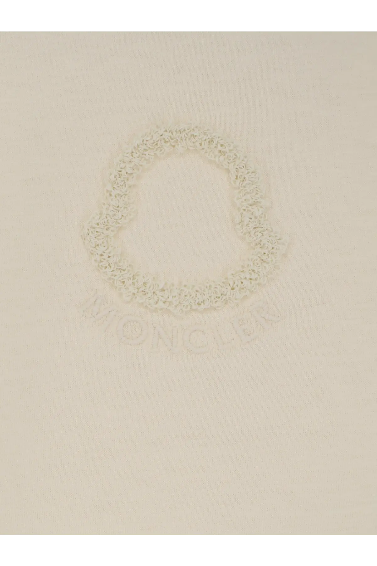 Cream-colored moncler logo embroidered on soft knit fabric of moncler womens white cotton shirt front side