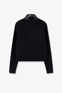 Moncler women’s down jacket black with black knit fabric and glossy black quilted collar for cold weather